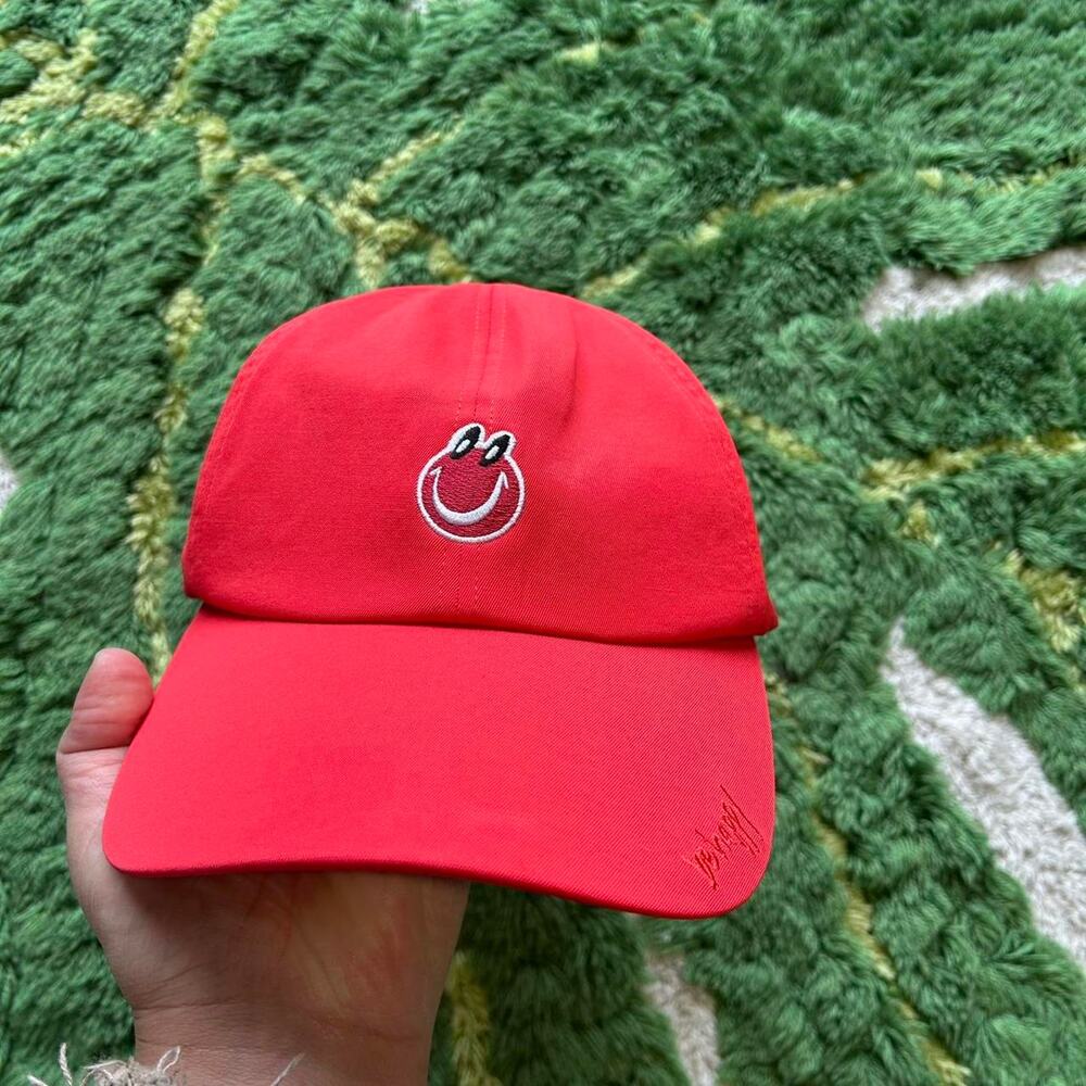 Lululemon red 'be happy' baseball cap